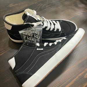 The Lizzie Mens High Top Vans Sneakers
